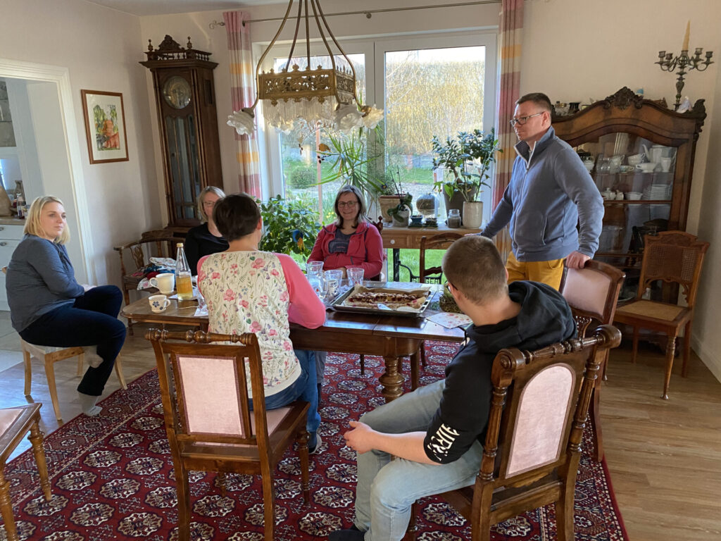 a group of people around a table